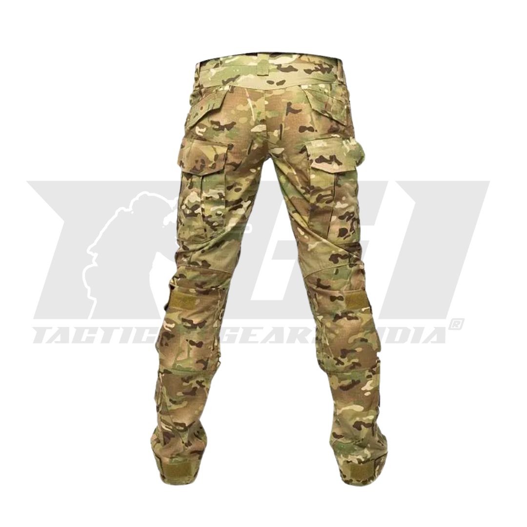 Multicam camouflage pants on a white background with a brand logo.
