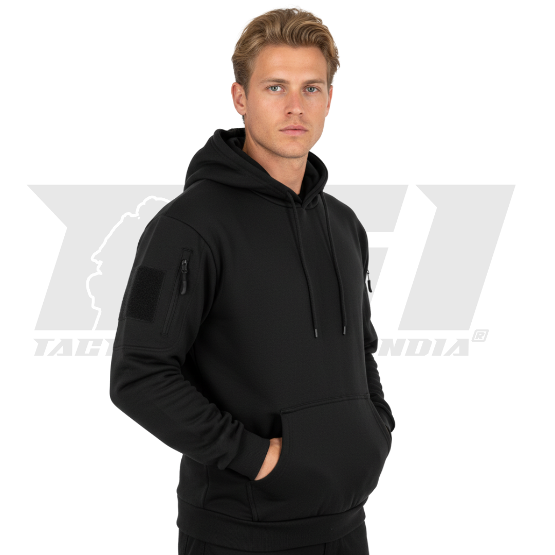 Person wearing the adjustable tactical hoodie in a winter setting